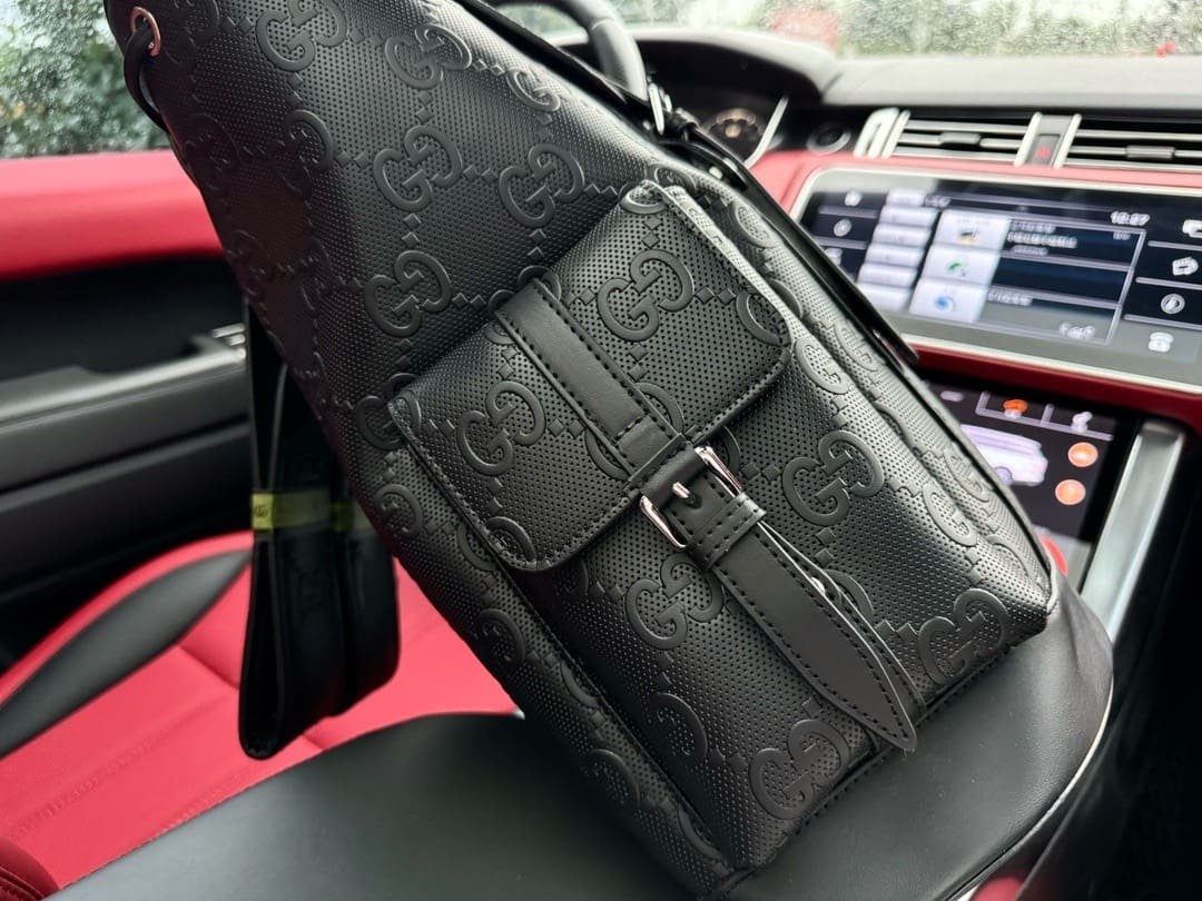 Gucci GG Leather Logo Embossed Backpack