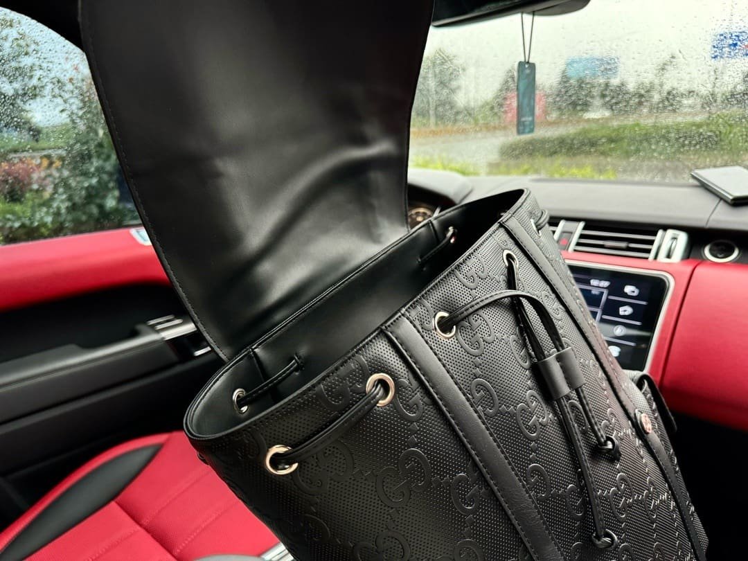 Gucci GG Leather Logo Embossed Backpack